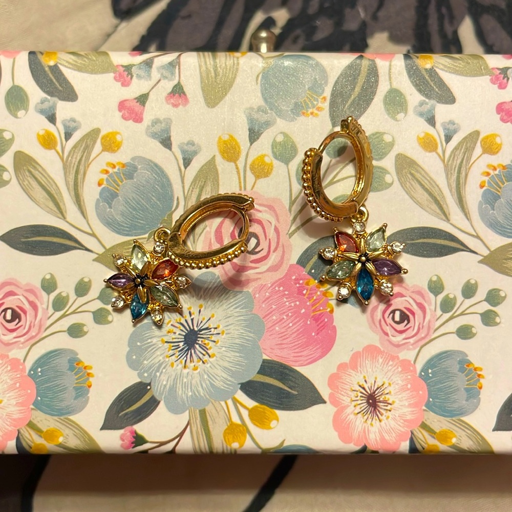 Beautiful gold flower earrings with colorful cubic zirconia.